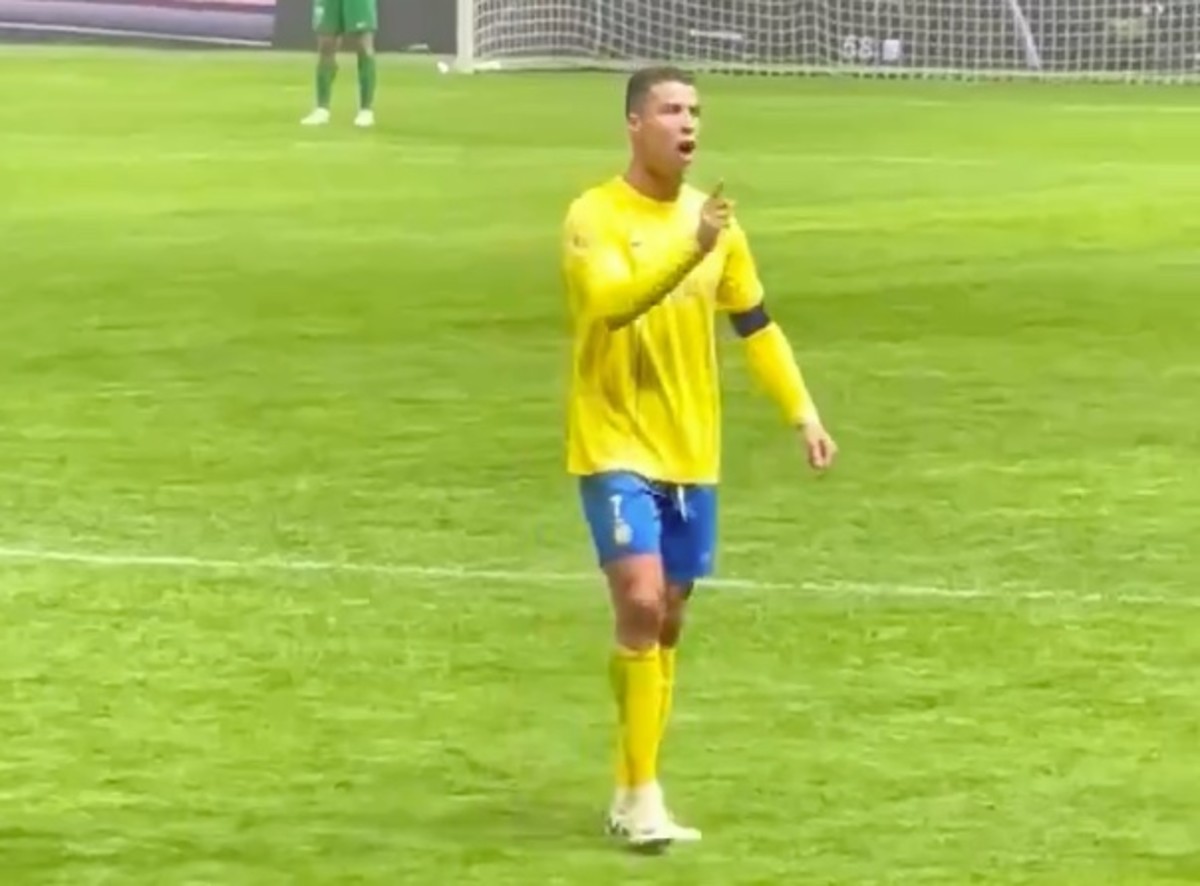 Al Nassr captain Cristiano Ronaldo pictured waving his finger while shouting at Al-Hilal fans after they chanted "Messi, Messi, Messi" during a game in the 2024 Riyadh Season Cup