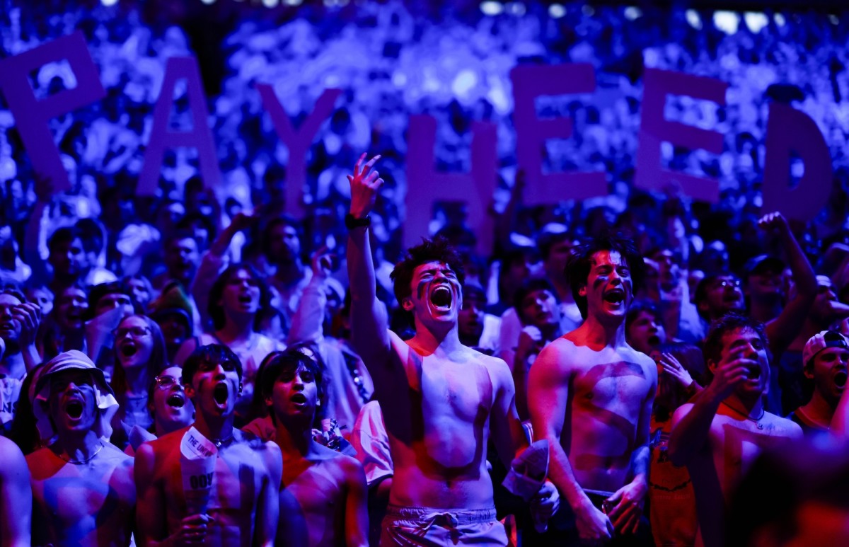 Kansas Jayhawks fans cheer prior to a game against the Houston Cougars at Allen Fieldhouse in Lawrence, Kansas, on Feb. 3, 2024.