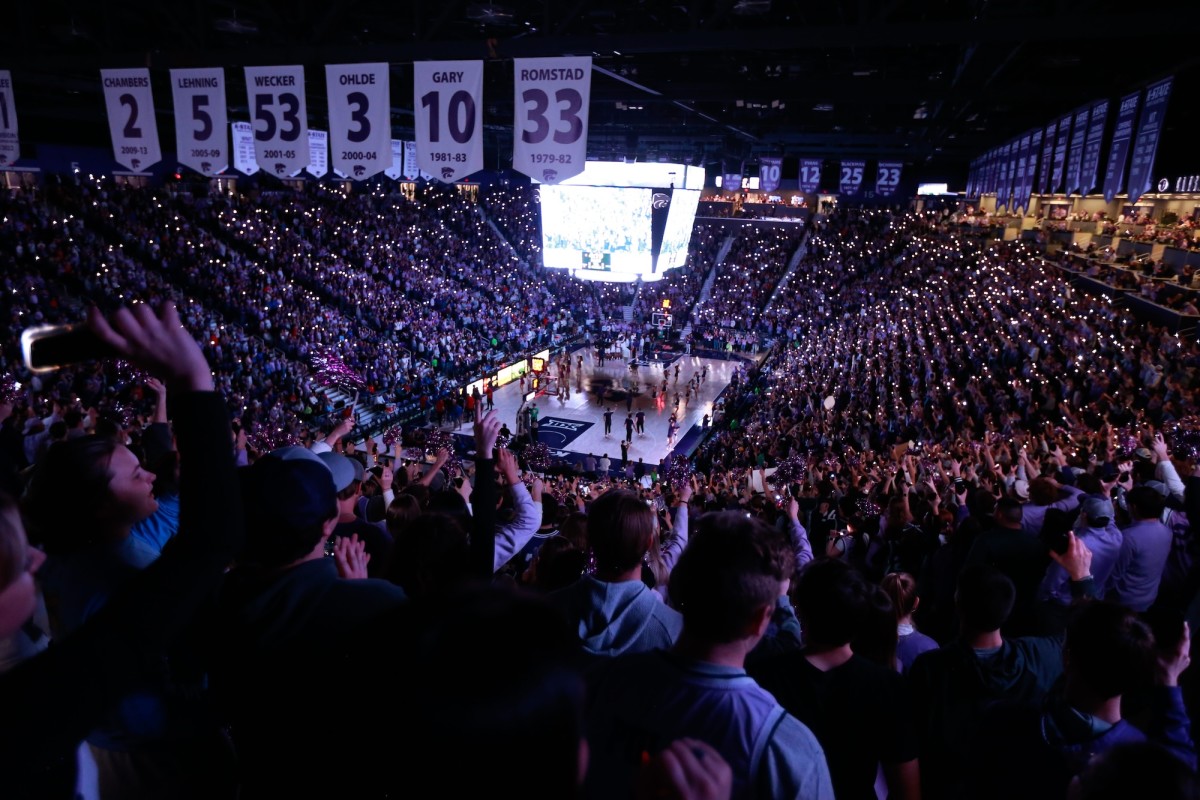 Kansas State fans shine lights while the song 'Sandstorm' plays in the second half of the Sunflower Showdown game against Kansas inside Bramlage Coliseum on Feb. 5, 2024.