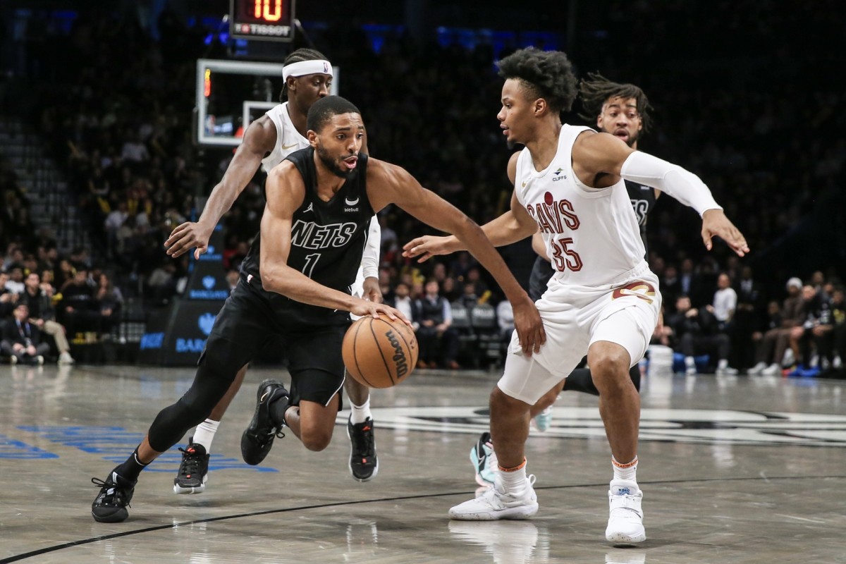 Brooklyn Nets forward Mikal Bridges (1) looks to drive past Cleveland Cavaliers forward Isaac Okoro (35) in the third quarter at Barclays Center.