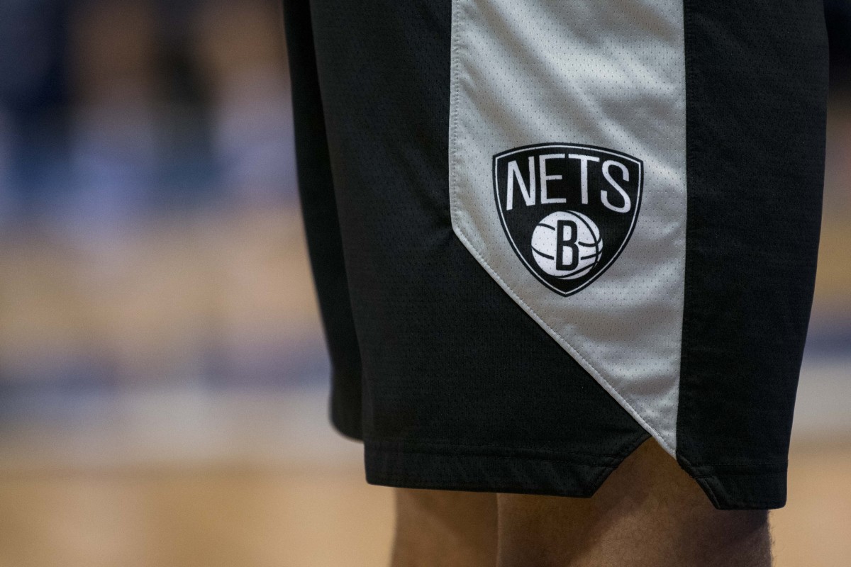 A view of the team logo on the shorts of Brooklyn Nets forward Jared Dudley (6) as he warms up before the game against the Dallas Mavericks at the American Airlines Center. 