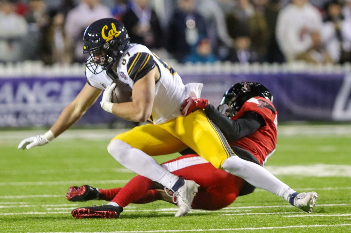 Texas Tech safety Dadrion Taylor-Demerson (right) tackles California tight end Jack Endries (left) during the 47th Radience Technology Independence Bowl Saturday evening, December 16, 2023, in Shreveport, La.  