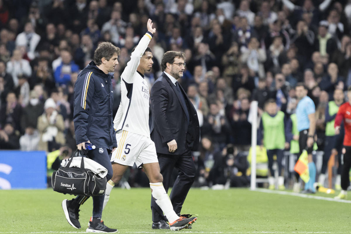 Jude Bellingham pictured (center) waving at the crowd while leaving the field with an ankle injury during Real Madrid's 4-0 win over Girona in February 2024