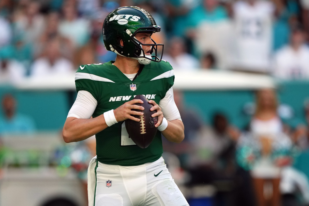 Dec 17, 2023; Miami Gardens, Florida, USA; New York Jets quarterback Zach Wilson (2) drops back to attempt a pass against the Miami Dolphins during the first half at Hard Rock Stadium. 