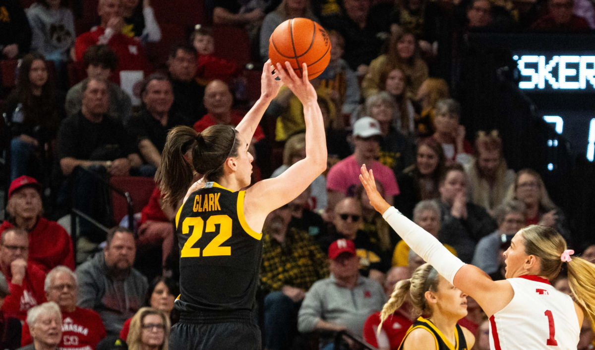 Iowa's Caitlin Clark shoots a three-point shot against Nebraska's Jaz Shelley during the second quarter Sunday at Pinnacle Bank Arena in Lincoln.
