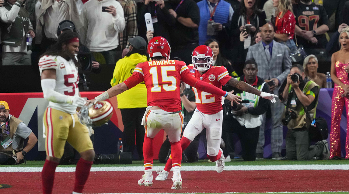 Kansas City Chiefs quarterback Patrick Mahomes celebrates with wide receiver Mecole Hardman after winning Super Bowl LVIII.