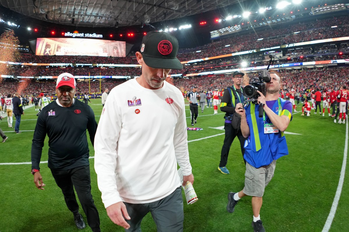San Francisco 49ers coach Kyle Shanahan walks off the field after losing Super Bowl LVIII to the Kansas City Chiefs.