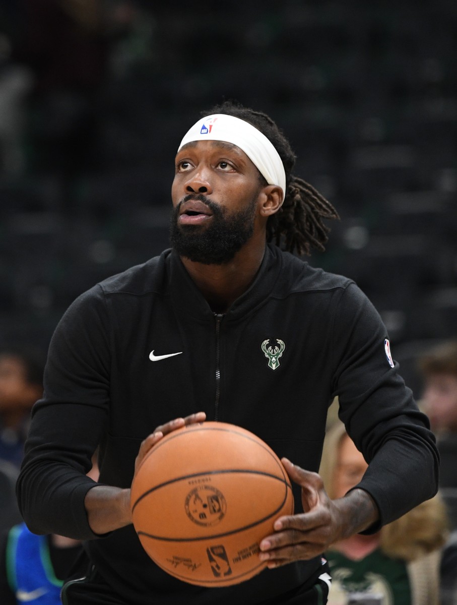Milwaukee Bucks guard Patrick Beverley (21) puts up a shot during warm ups before a game against the Charlotte Hornets