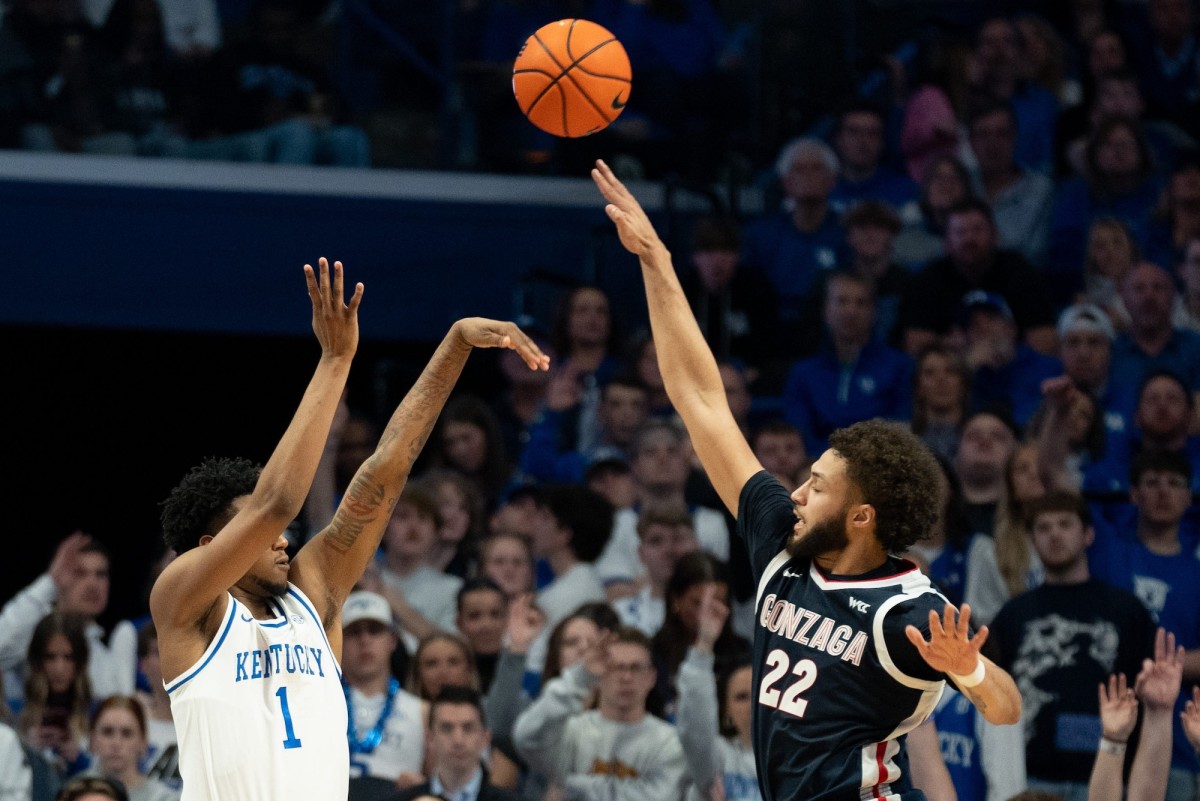 Kentucky Wildcats guard Justin Edwards goes for a three-pointer against Gonzaga Bulldogs forward Anton Watson during their game on Feb. 10, 2024, at Rupp Arena.