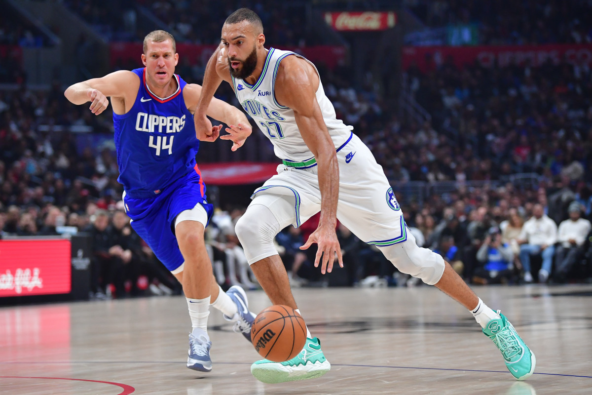 Feb 12, 2024; Los Angeles, California, USA; Minnesota Timberwolves center Rudy Gobert (27) moves to the basket against Los Angeles Clippers center Mason Plumlee (44) during the first half at Crypto.com Arena.