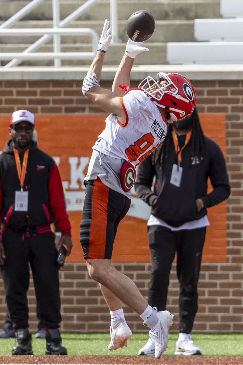 Feb 1, 2024; Mobile, AL, USA; American wide receiver Ladd McConkey of Georgia makes an over the shoulder catch during practice for the American team at Hancock Whitney Stadium. © Vasha Hunt-USA TODAY Sports