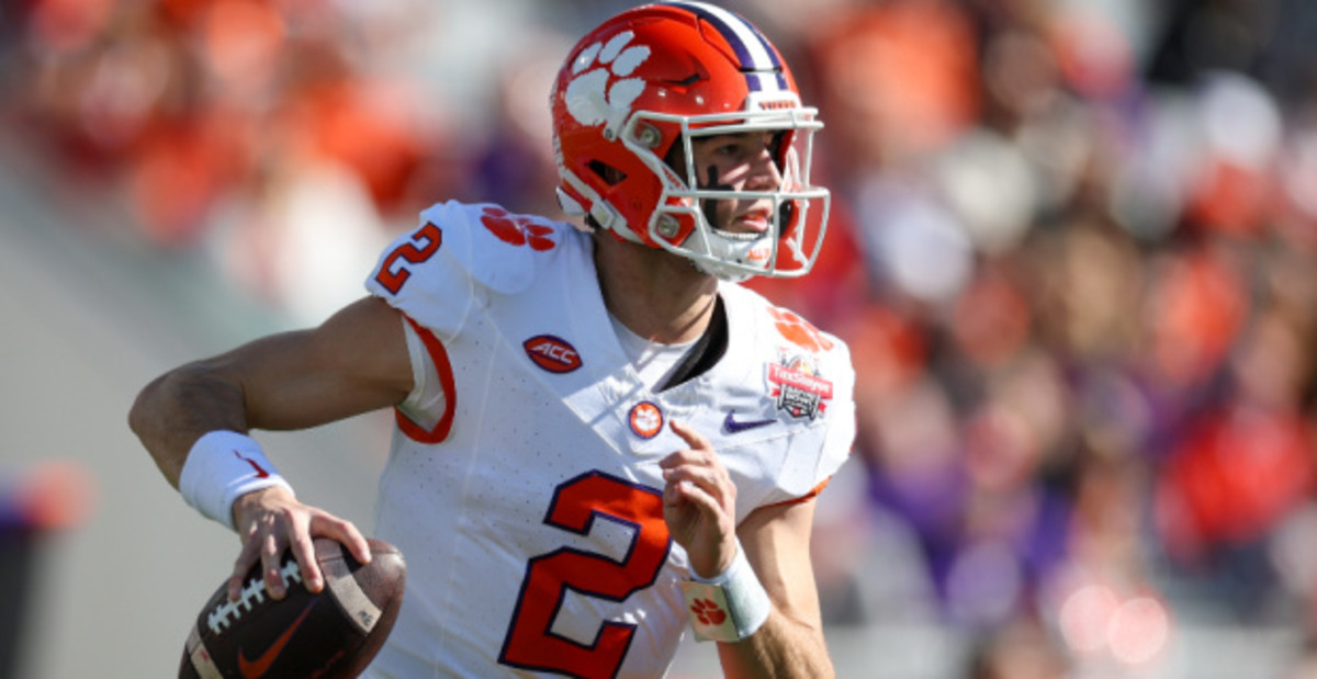 Clemson Tigers quarterback Cade Klubnik on a rushing attempt during a college football game in the ACC.