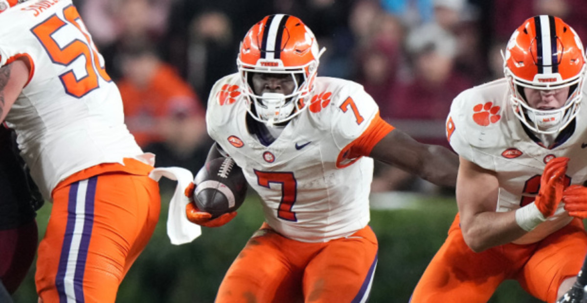 Clemson Tigers running back Phil Mafah on a rushing attempt during a college football game in the ACC.
