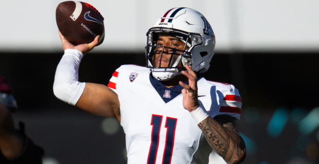 Arizona Wildcats quarterback Noah Fifita attempts a pass during a college football game in the Big 12.