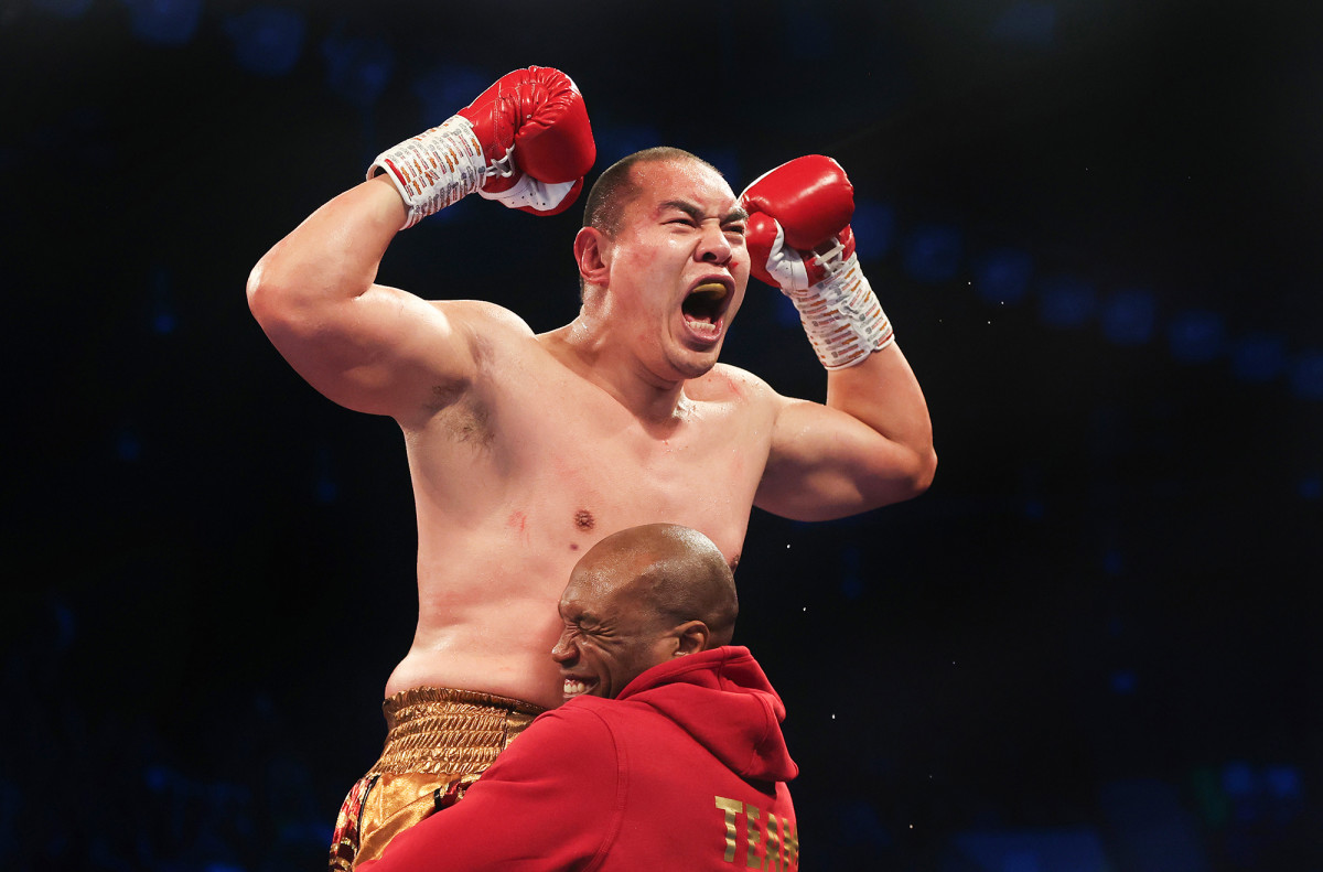 Zhilei Zhang celebrates after defeating British boxer Joe Joyce.