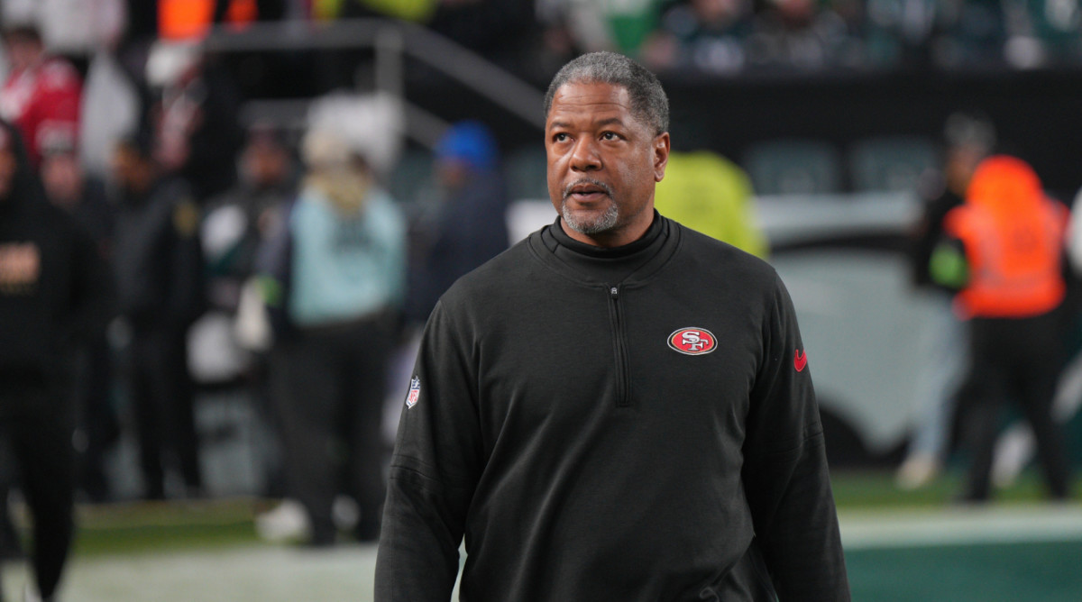 49ers defensive coordinator Steve Wilks on the field before a game.