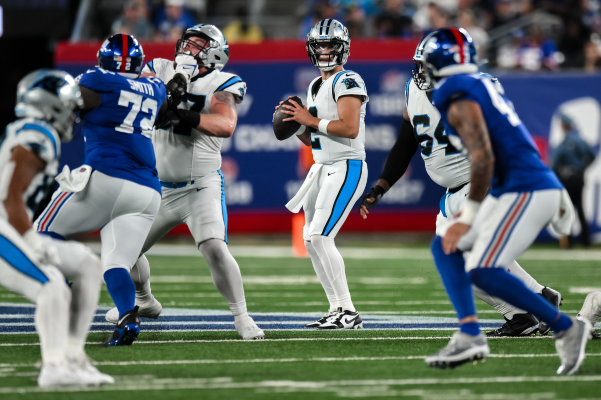 Aug 18, 2023; East Rutherford, New Jersey, USA; Carolina Panthers quarterback Matt Corral (2) looks to pass the ball against the New York Giants during the third quarter at MetLife Stadium. Mandatory Credit: John Jones-USA TODAY Sports