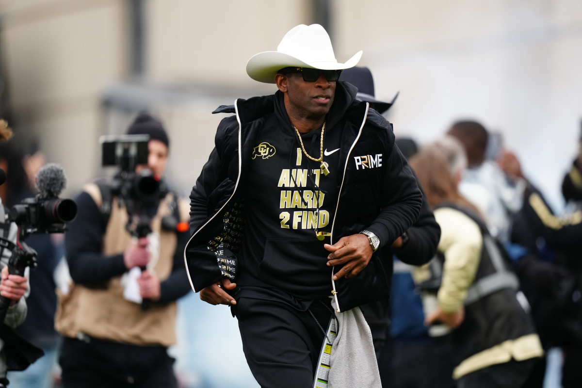 Colorado Buffaloes head coach Deion Sanders hits the field before the start of the spring game at Folsom Field