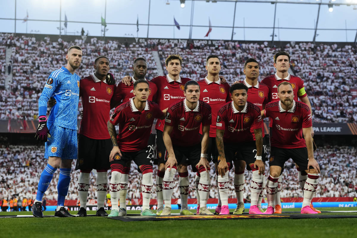 A Manchester United team photo taken in April 2023 before an away game against Sevilla in the UEFA Europa League
