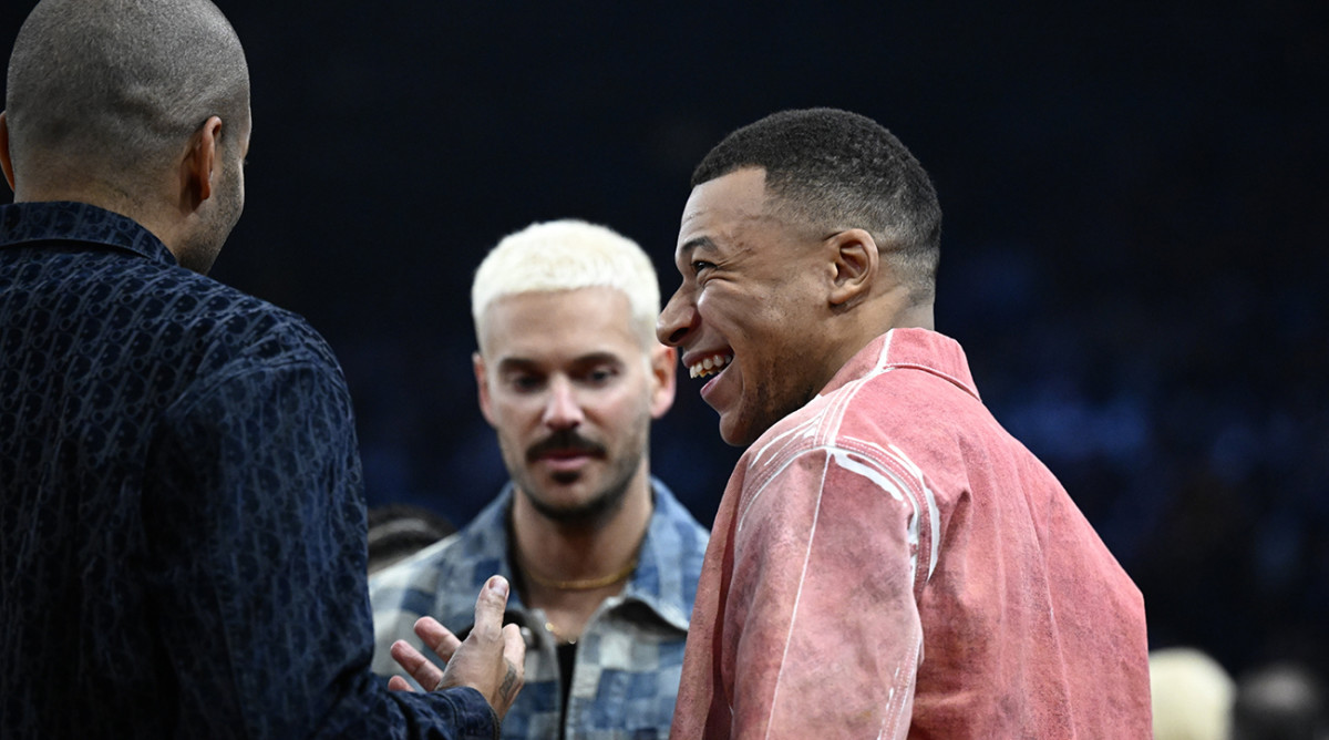 Kylian Mbappé (right) in attendance at the NBA Paris Game between the Brooklyn Nets and the Cleveland Cavaliers at AccorHotels Arena.