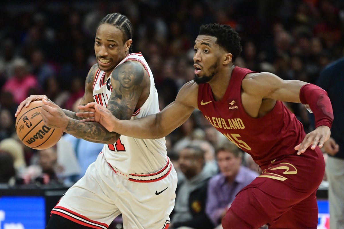 Chicago Bulls forward DeMar DeRozan (11) drives to the basket against Cleveland Cavaliers guard Donovan Mitchell (45) during the second half at Rocket Mortgage FieldHouse. 