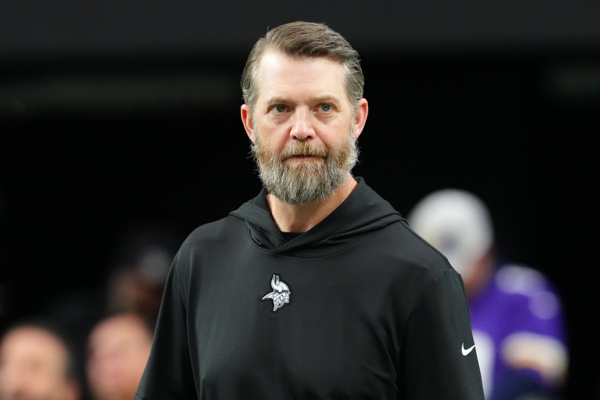 Dec 10, 2023; Paradise, Nevada, USA; Minnesota Vikings Offensive Coordinator Wes Phillips walks on the field before a game between the Vikings and the Las Vegas Raiders at Allegiant Stadium.