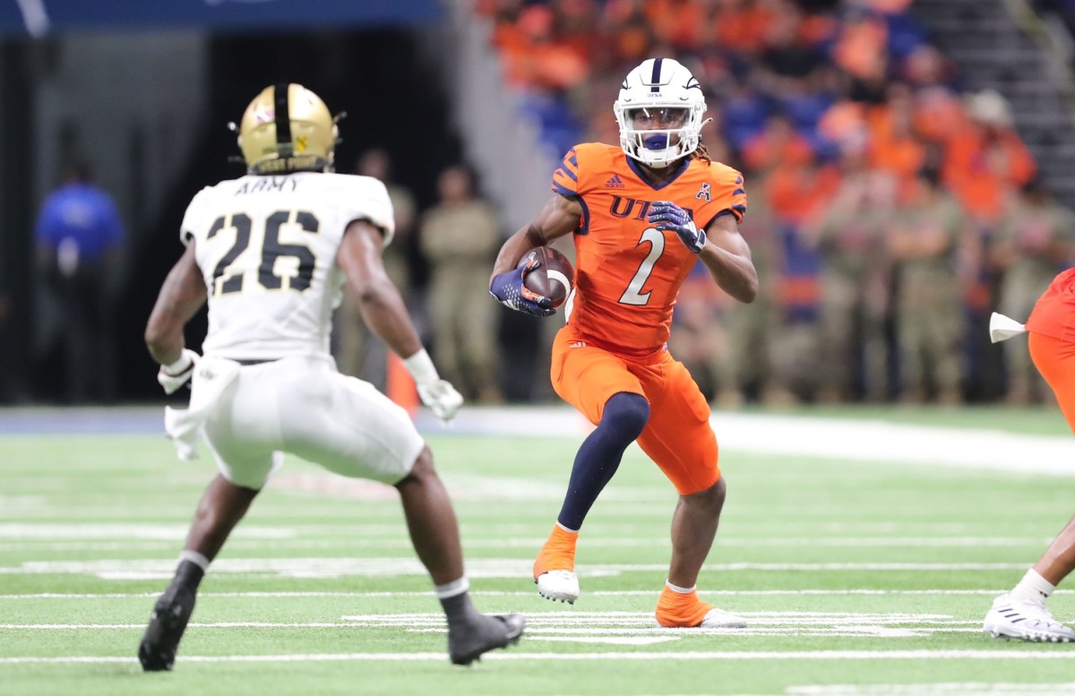 Sep 15, 2023; San Antonio, Texas, USA; UTSA Roadrunners wide receiver Joshua Cephus (2) runs after a catch in front of Army Black Knights defensive back Quindrelin Hammonds (26) during the first half at the Alamodome. Mandatory Credit: Danny Wild-USA TODAY Sports  