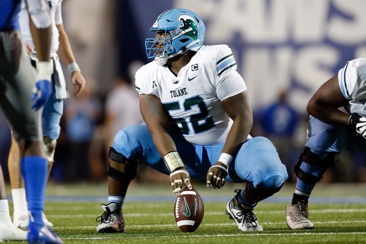 Oct 13, 2023; Memphis, Tennessee, USA; Tulane Green Wave offensive linemen Sincere Haynesworth (52) waits to snap the ball during the first half against the Memphis Tigers at Simmons Bank Liberty Stadium. Mandatory Credit: Petre Thomas-USA TODAY Sports  