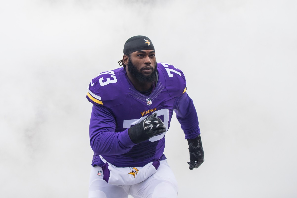 Dec 20, 2015; Minneapolis, MN, USA; Minnesota Vikings defensiive lineman Sharrif Floyd (73) gets introduced before the game against the Chicago Bears at TCF Bank Stadium.