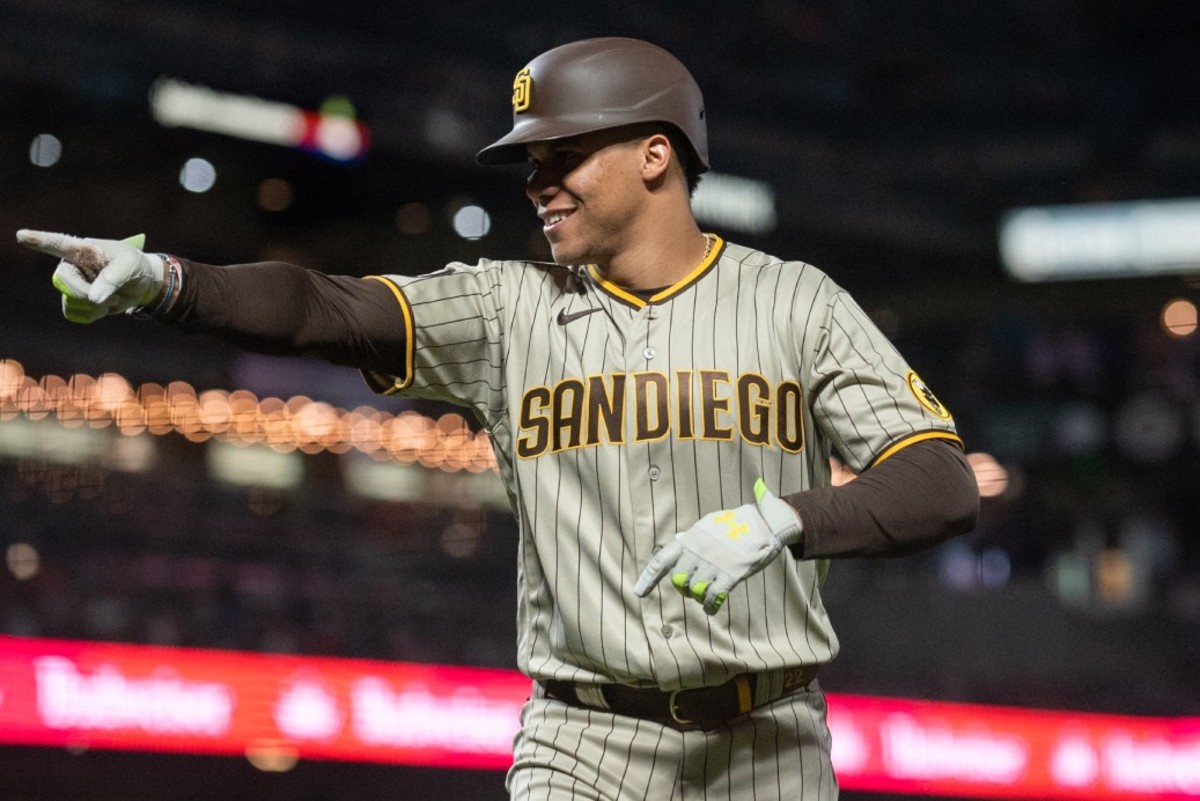 Sep 26, 2023; San Francisco, California, USA; San Diego Padres left fielder Juan Soto (22) points to hit team mates after hitting a home run during the seventh inning against the San Francisco Giants at Oracle Park.