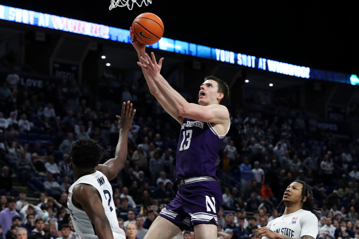 Northwestern Wildcats guard Brooks Barnhizer (13) drives the ball to the basket during the second half against the Penn State Nittany Lions at Bryce Jordan Center. Northwestern defeated Penn State 76-72.