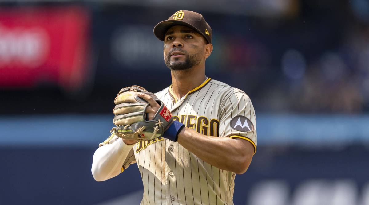 Padres infielder Xander Bogaerts looks on while in the field during a game.