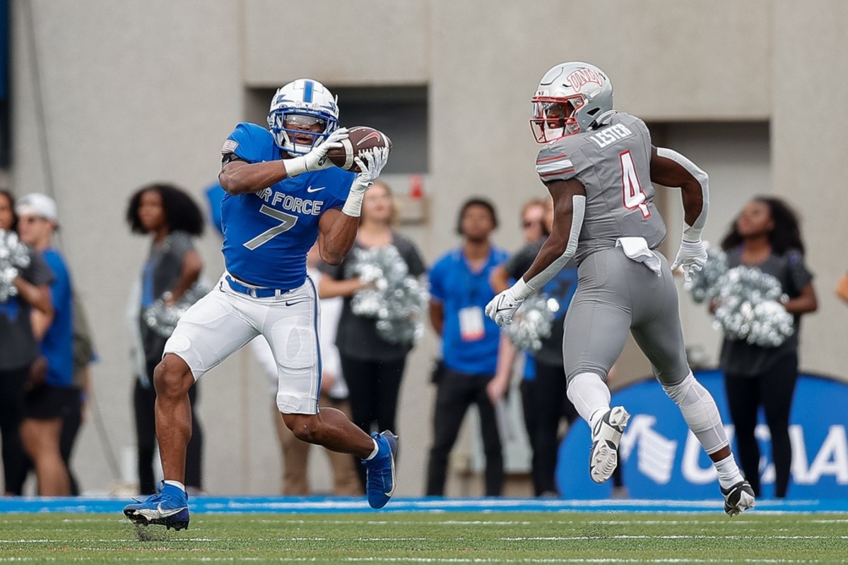 Nov 18, 2023; Colorado Springs, Colorado, USA; Air Force Falcons safety Trey Taylor (7) intercepts a pass intended for UNLV Rebels running back Donavyn Lester (4) in the first quarter at Falcon Stadium. Mandatory Credit: Isaiah J. Downing-USA TODAY Sports  