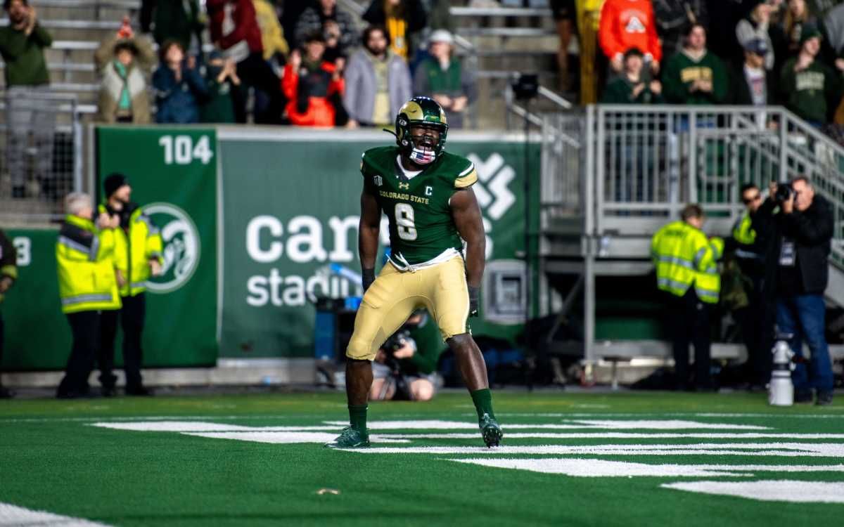 CSU football's senior defensive lineman Mohamed Kamara (8) celebrates his sack for a safety.