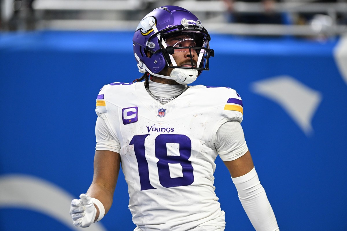 Jan 7, 2024; Detroit, Michigan, USA; Minnesota Vikings wide receiver Justin Jefferson (18) looks up into the crowd after scoring a touchdown against the Detroit Lions in the third quarter at Ford Field.