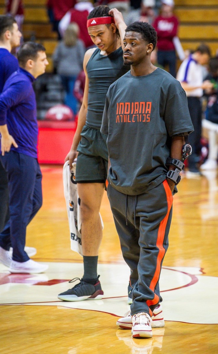 Indiana's Xavier Johnson (0) wears the new Fear of God clothing during warm-ups before the start of the Indiana versus Northwestern men's basketball game at Simon Skjodt Aseembly Hall on Sunday, Feb. 18, 2024.