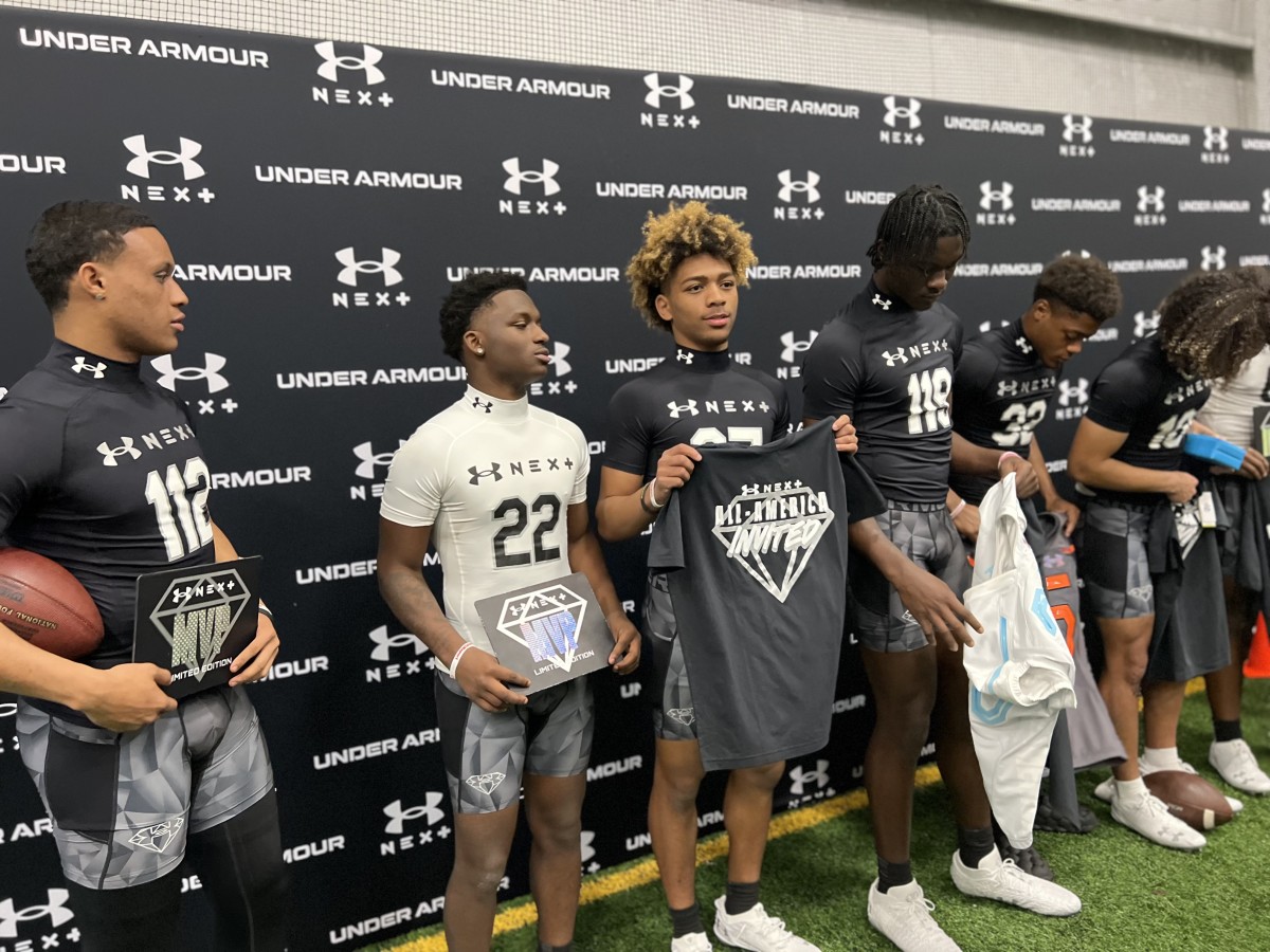 KJ Lacey (center) gains an invite to the Under Armour All-America Game