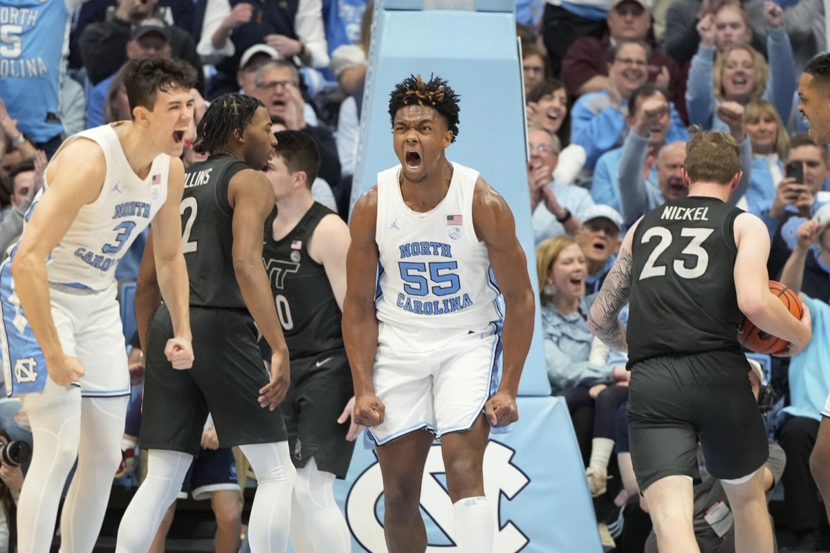 North Carolina Tar Heels forward Harrison Ingram (55) reacts with guard Cormac Ryan (3) after scoring in the first half at Dean E. Smith Center in Chapel Hill, North Carolina, on Feb. 17, 2024.