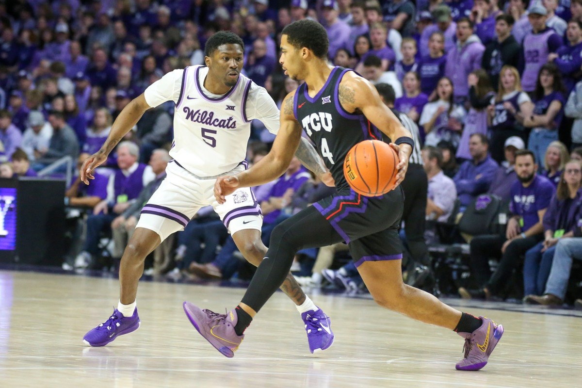 TCU Horned Frogs guard Jameer Nelson Jr. (4) is guarded by Kansas State Wildcats guard Cam Carter (5) during the first half at Bramlage Coliseum. 