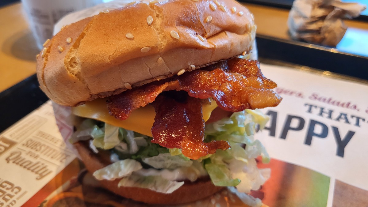 The BBQ Bacon Char Burger at The Habit Burger Grill comes loaded with tomatoes, pickles, onions and lettuce, plus barbecue sauce. It can quickly get out of control if you're not careful. Eat quickly.