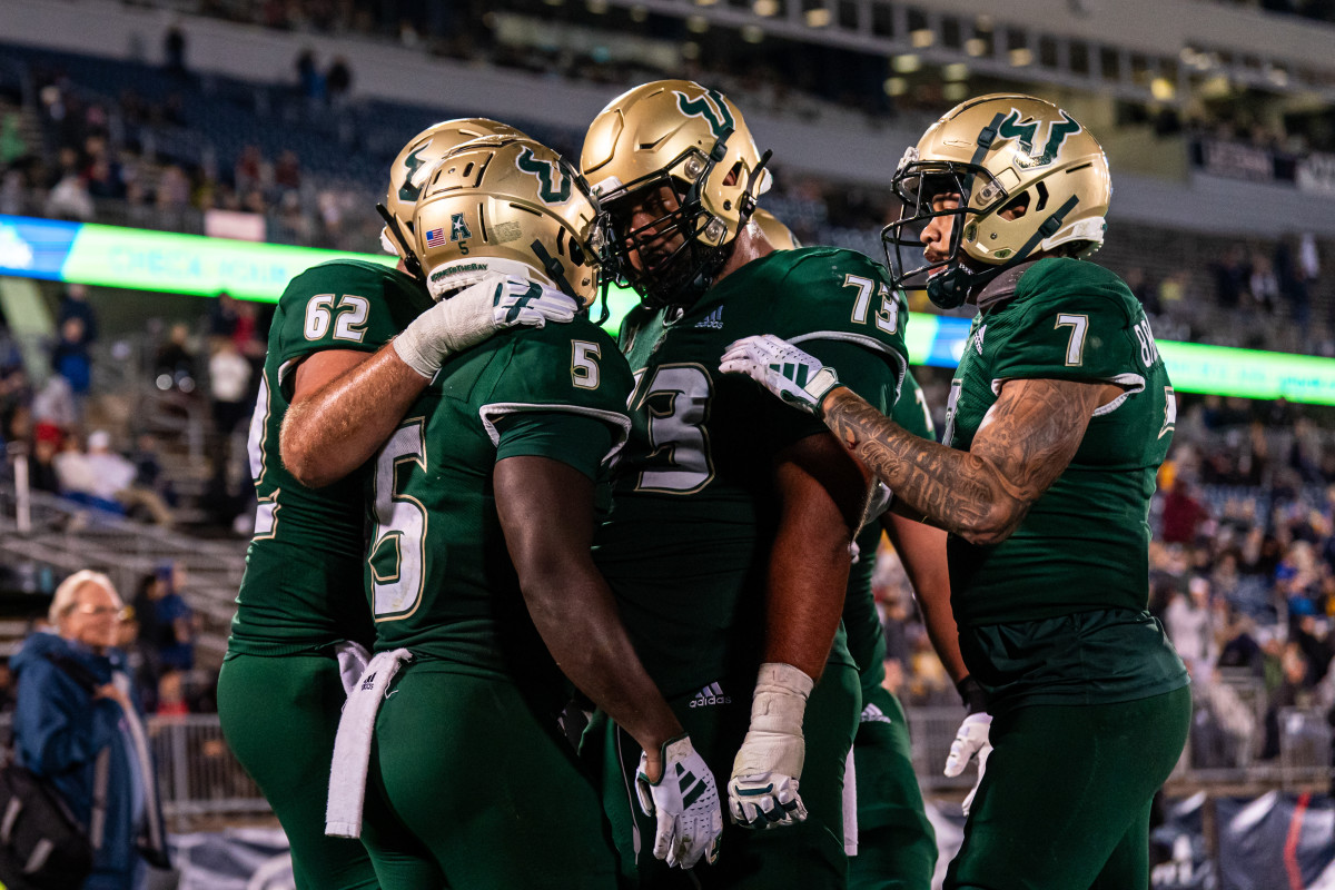 Oct 21, 2023; East Hartford, Connecticut, USA; South Florida Bulls running back Nay'Quan Wright (5) is congratulated after running the ball for a touchdown against the UConn Huskies in the second half at Rentschler Field at Pratt & Whitney Stadium. Mandatory Credit: David Butler II-USA TODAY Sports