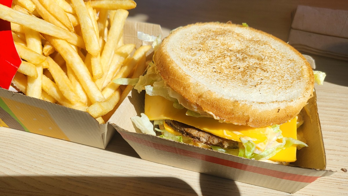 McDonald's Big Mac and famous fries have been a perfect fast-food combo since the Big Mac went nationwide in 1968. I take the top sesame seed bun off and replace it with the middle bun. It's easier to eat this way, and you save stomach space without that unnecessary sesame bun.