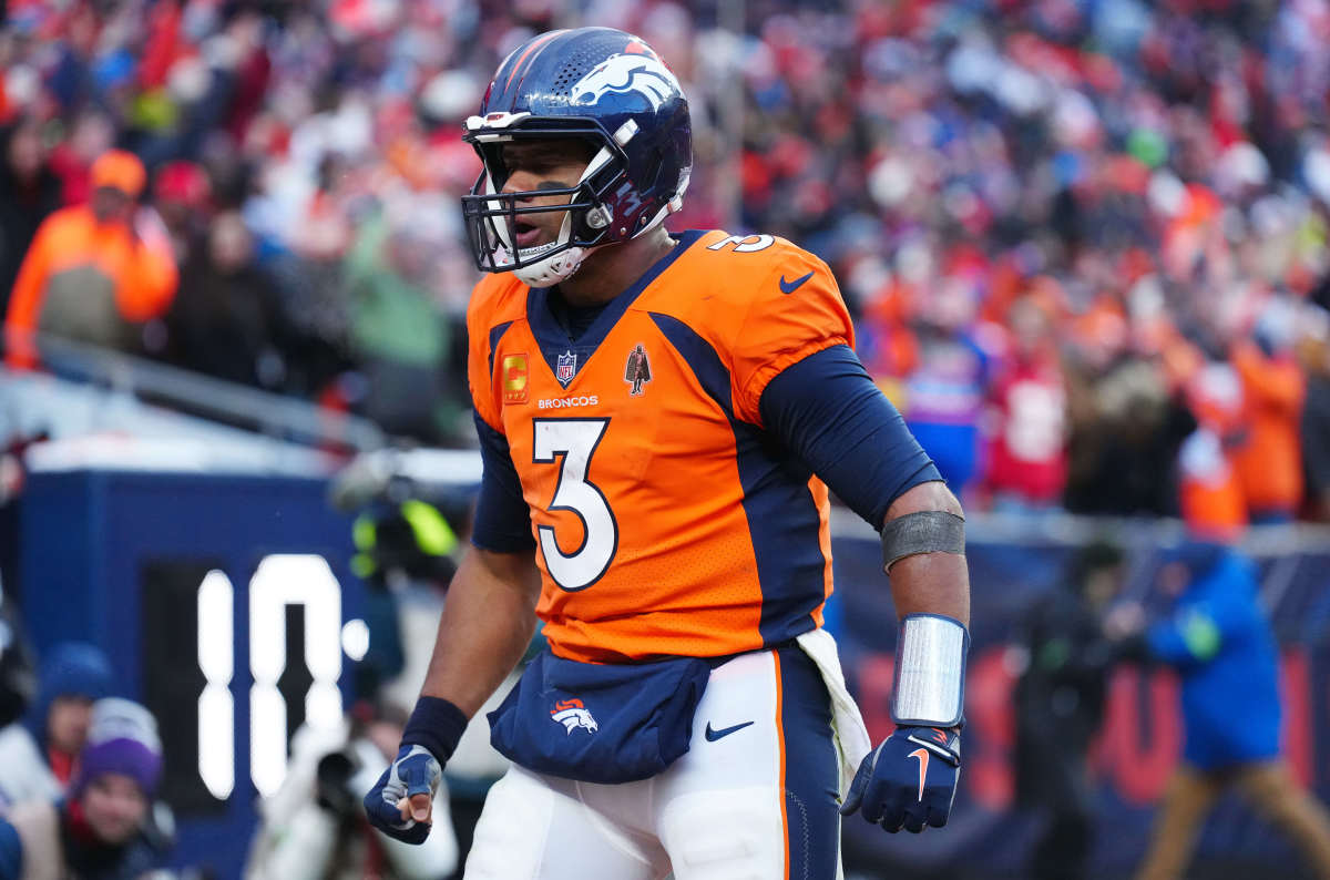 Oct 29, 2023; Denver, Colorado, USA; Denver Broncos quarterback Russell Wilson (3) celebrates a touchdown pass in the fourth quarter against the Kansas City Chiefs at Empower Field at Mile High. Mandatory Credit: Ron Chenoy-USA TODAY Sports