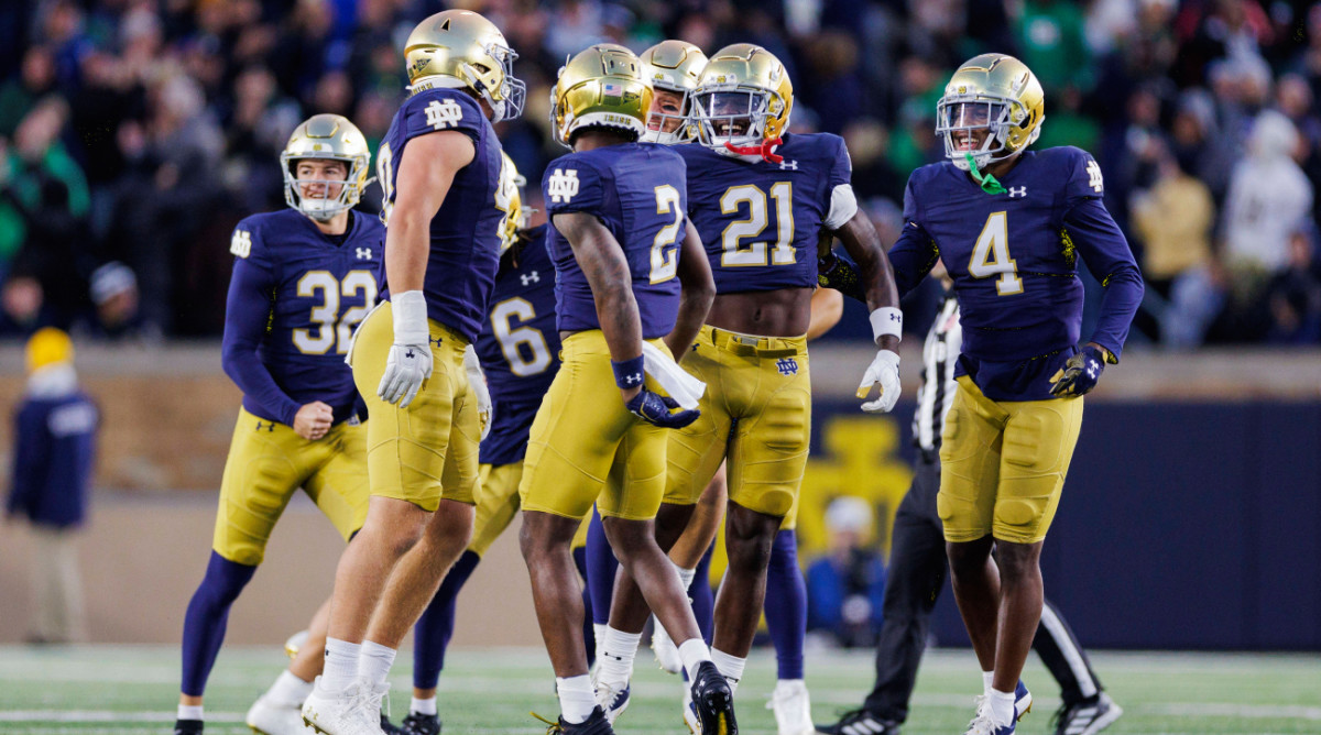 Notre Dame defensive players celebrate a play against Wake Forest.