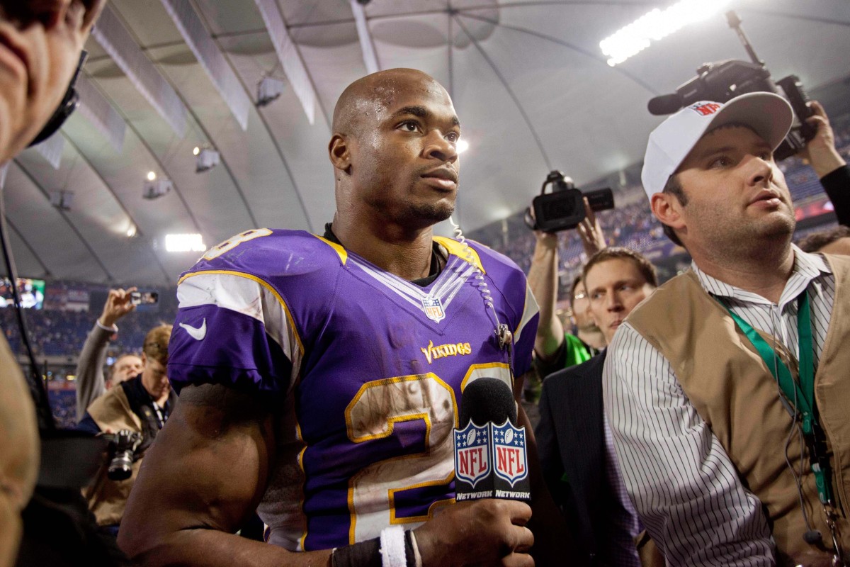 Dec 30, 2012; Minneapolis, MN, USA; Minnesota Vikings running back Adrian Peterson (28) awaits a post-game interview after defeating the Green Bay Packers at the Metrodome.