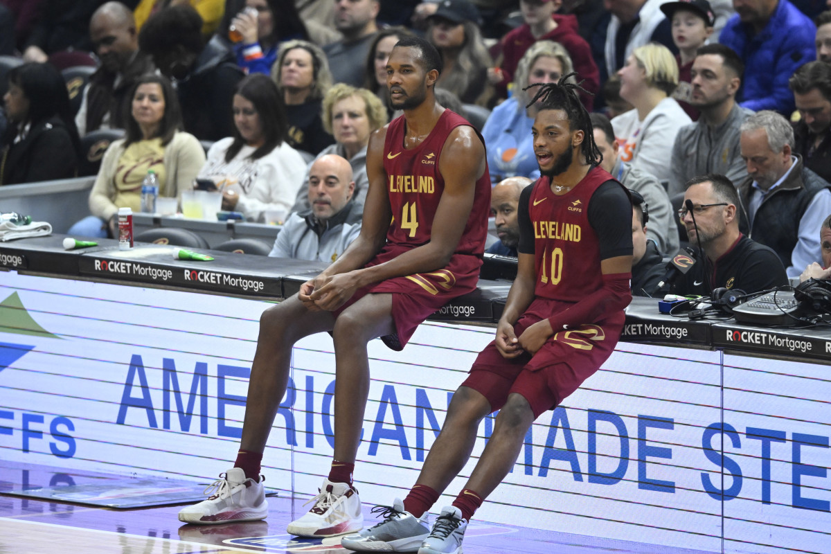 Nov 30, 2023; Cleveland, Ohio, USA; Cleveland Cavaliers forward Evan Mobley (4) and guard Darius Garland (10) wait to enter the game in the first quarter against the Portland Trail Blazers at Rocket Mortgage FieldHouse.