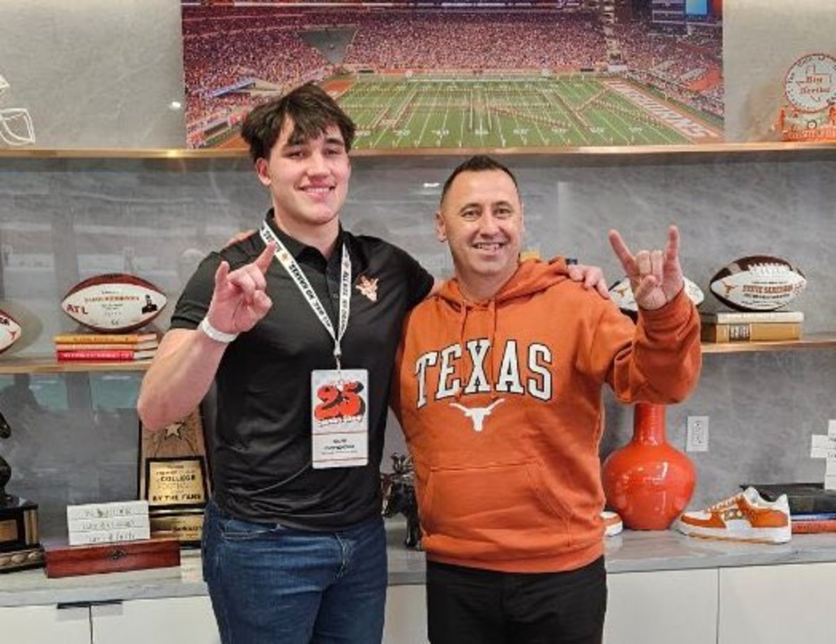 Gus Cordova pictured with Texas coach Steve Sarkisian