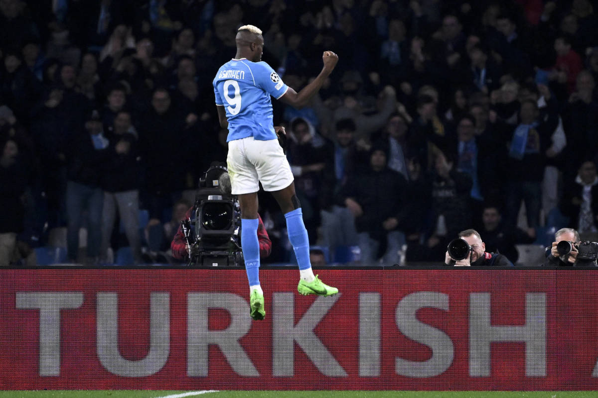 Victor Osimhen pictured celebrating after scoring for Napoli in a 1-1 draw with Barcelona in February 2024