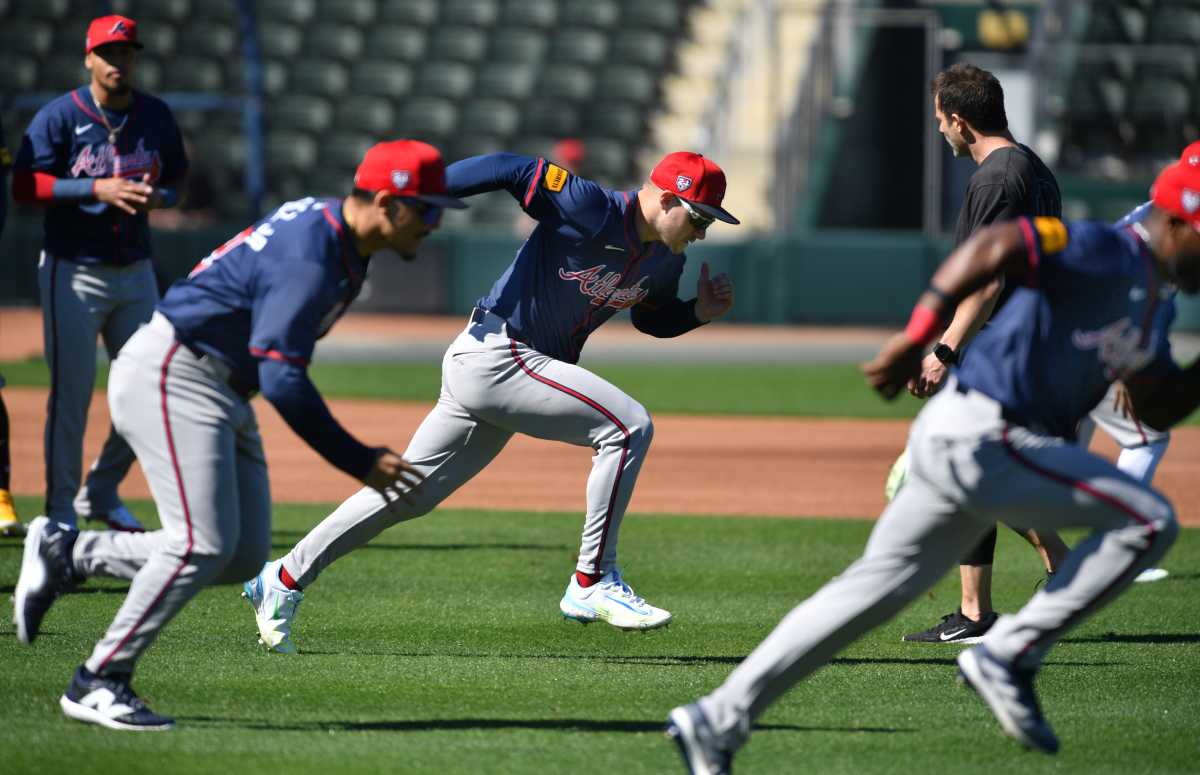 Atlanta Braves infielder Jarred Kelenic (#24) and his teammates run sprints at the start of practice Tuesday, Feb. 20, 2024 at CoolToday Park in North Port, Florida.  