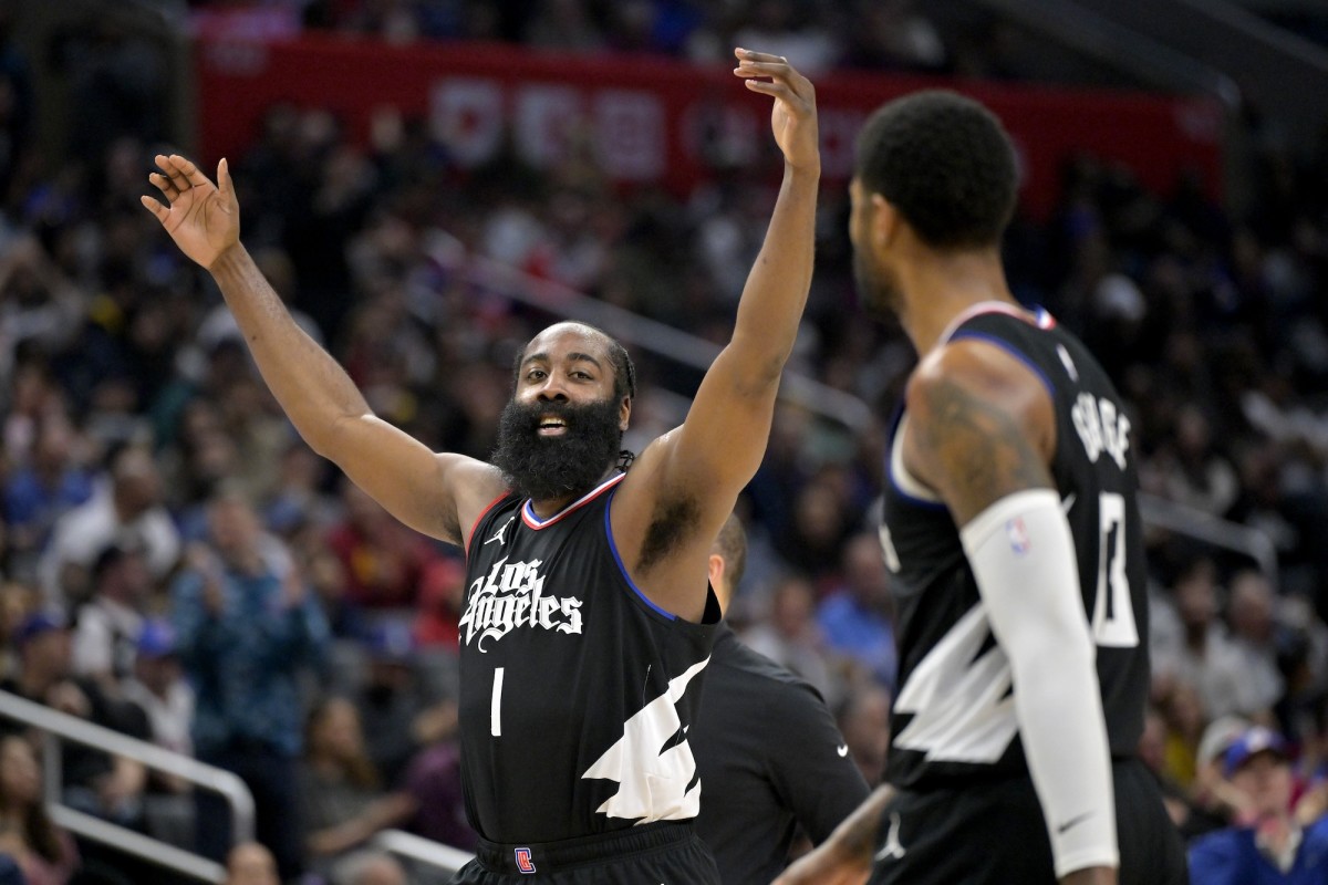 Los Angeles Clippers guard James Harden (1) waves to the crowd after a basket in the second half against the Detroit Pistons at Crypto.com Arena in Los Angeles on Feb. 10, 2024.
